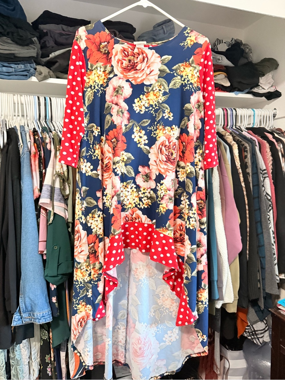 Women’s Navy Floral High-Low tunic blouse with matchinwith Red Polka Dot Accents
